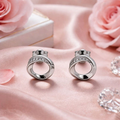 Twisted Pave Infinity Loop Studs in 925 Silver
